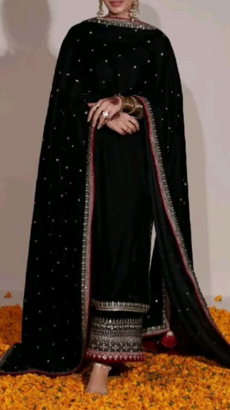 Black Pant Suit Has Bold Elegance with Cultural Depth